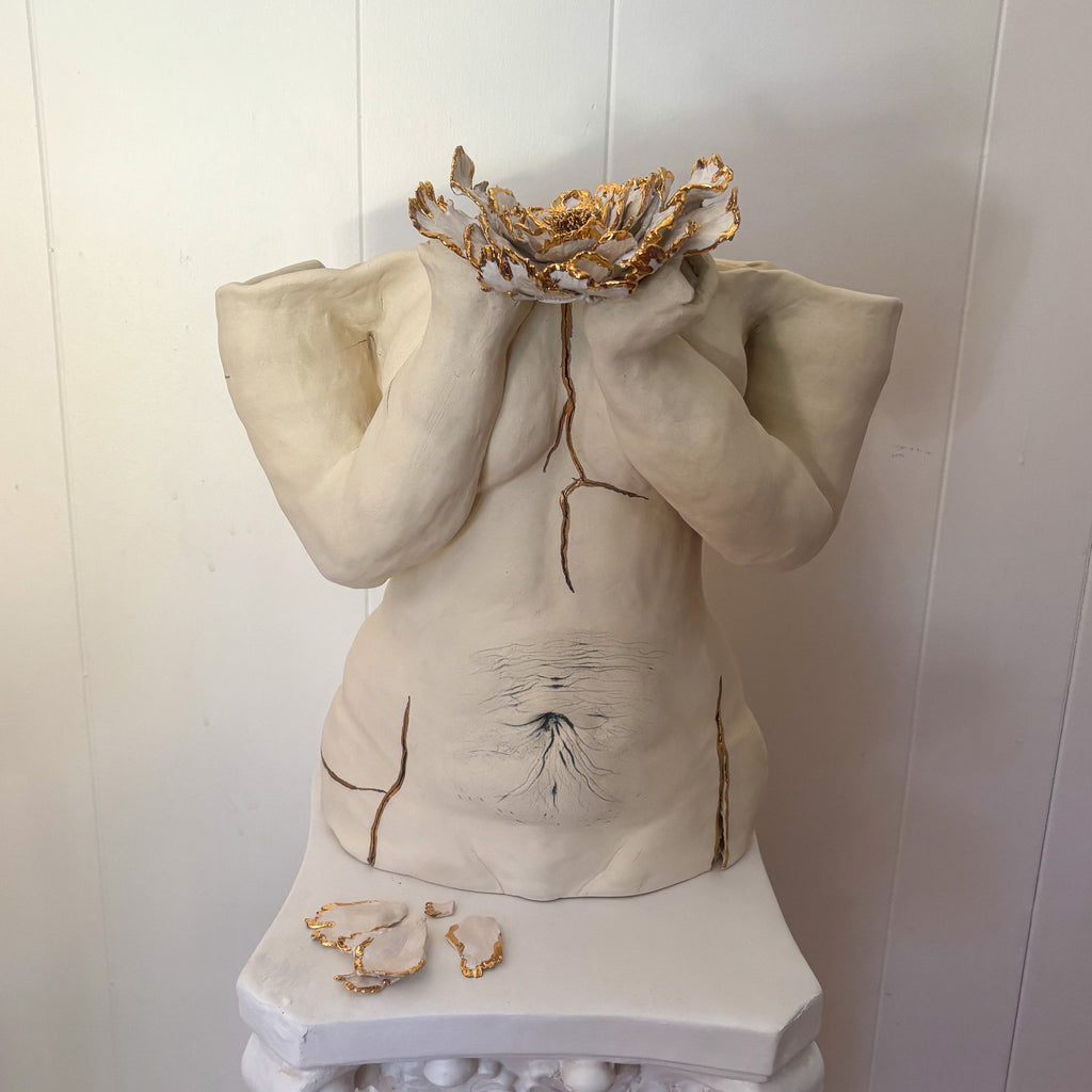 A straight-on view of "She Who Holds".