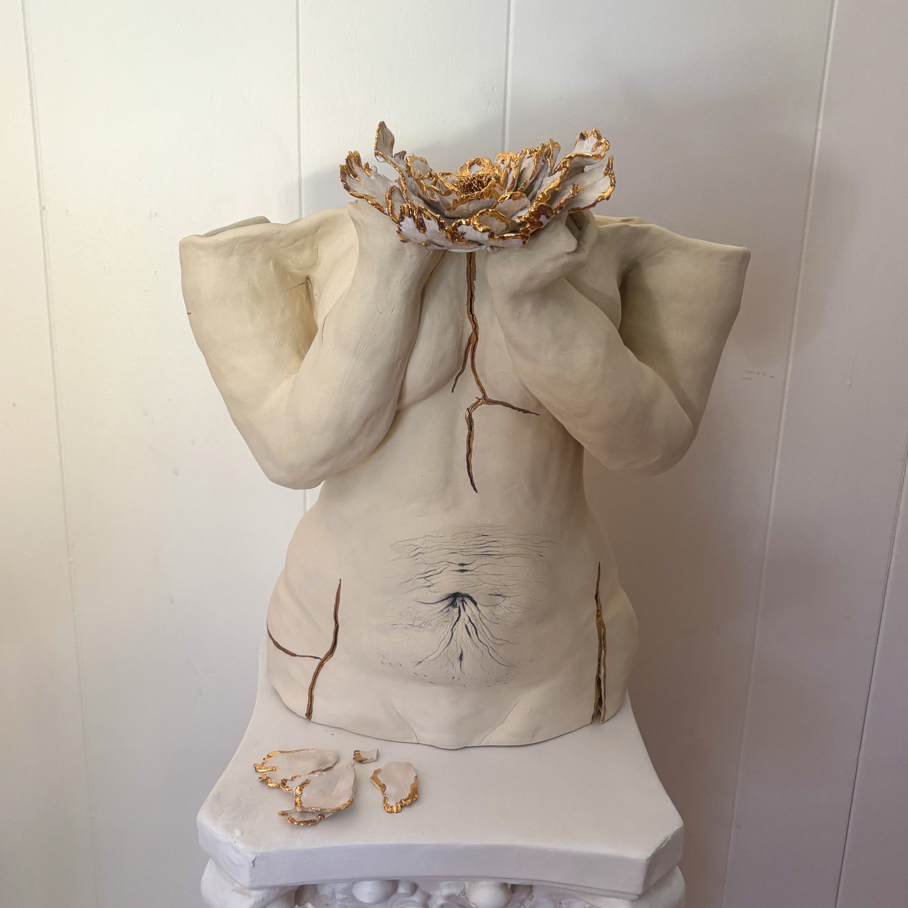 A straight-on view of "She Who Holds".