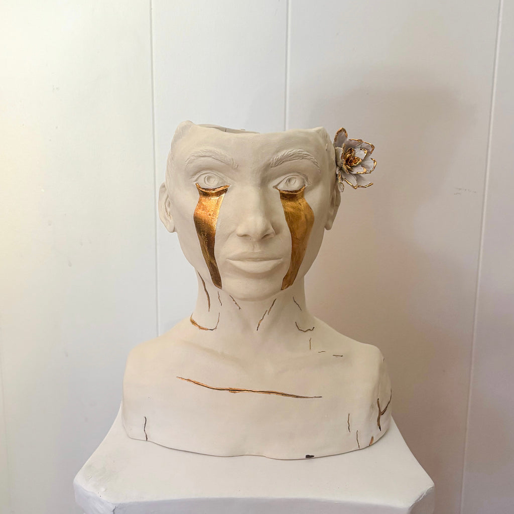 A front-angle view of "She Who Sheds".
