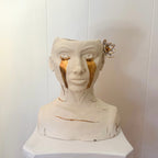 A front-angle view of "She Who Sheds".