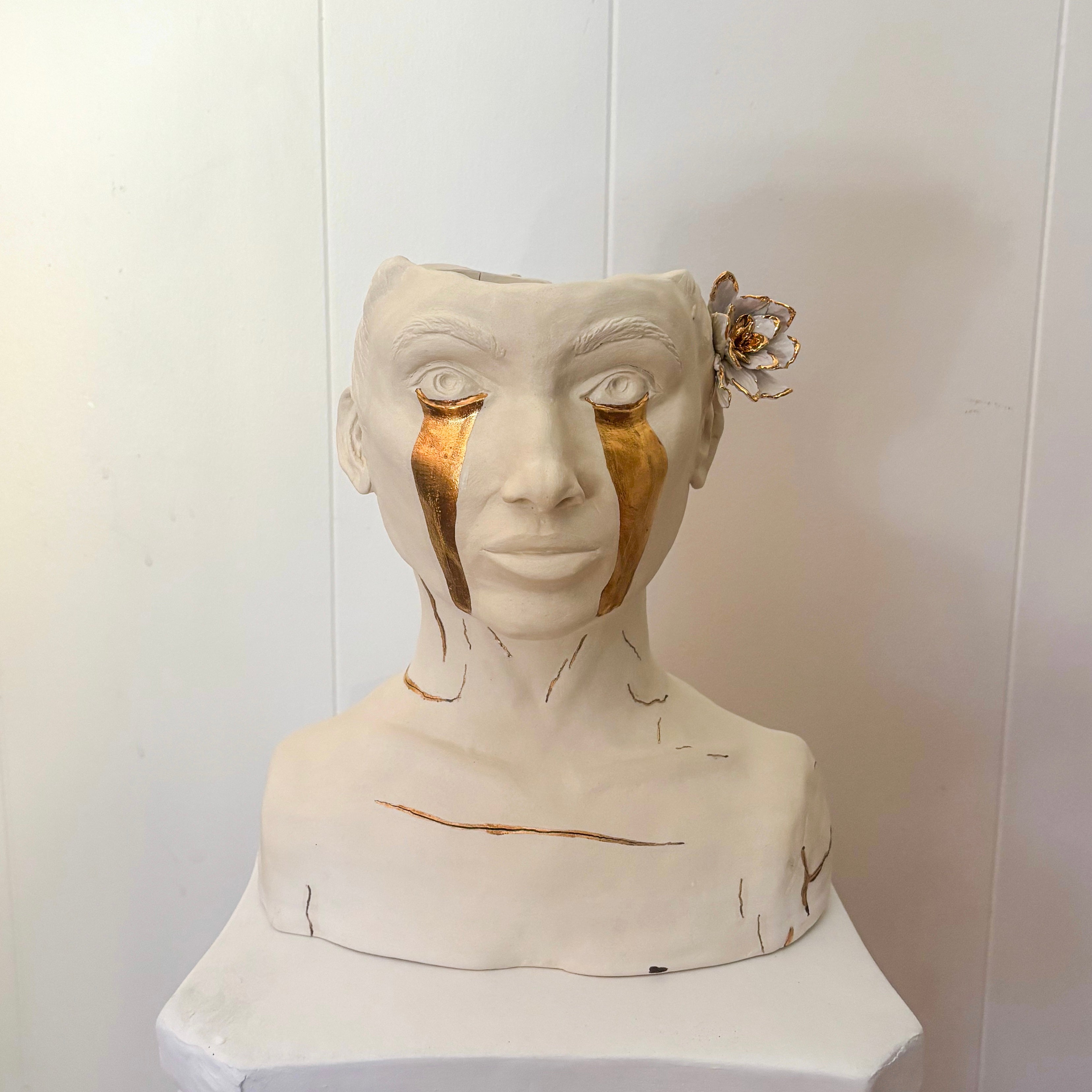 A front-angle view of "She Who Sheds".