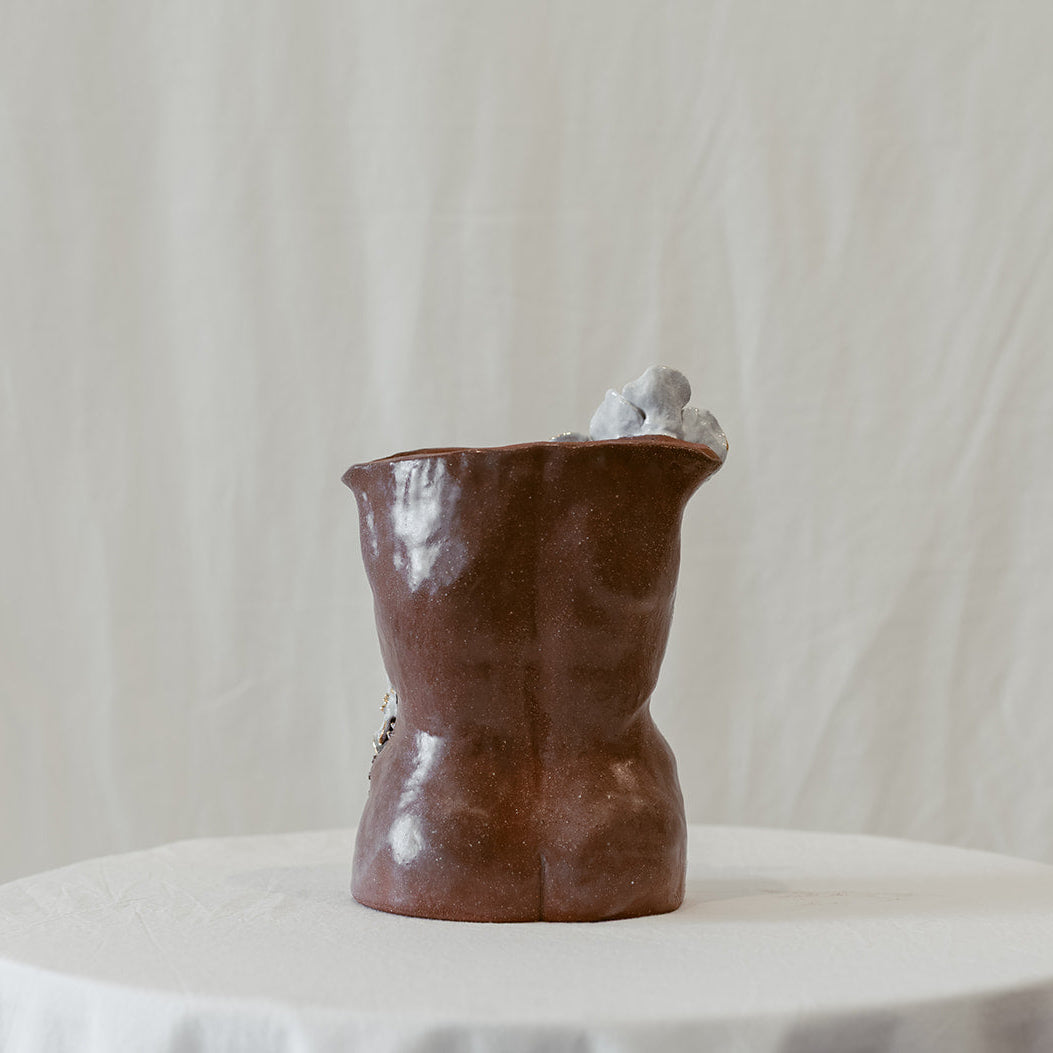 A back view of "She Who Waits".