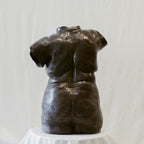 A complete back view of "She Who Feels".